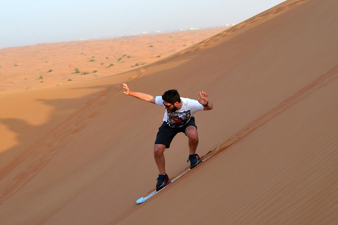 Dubai Morning Quad Bike With Sandboarding and Camel Ride