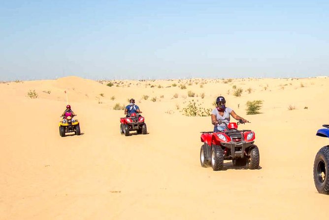 Evening Safari With Quad Bike, Camel Riding, BBQ Dinner and Dune Bashing
