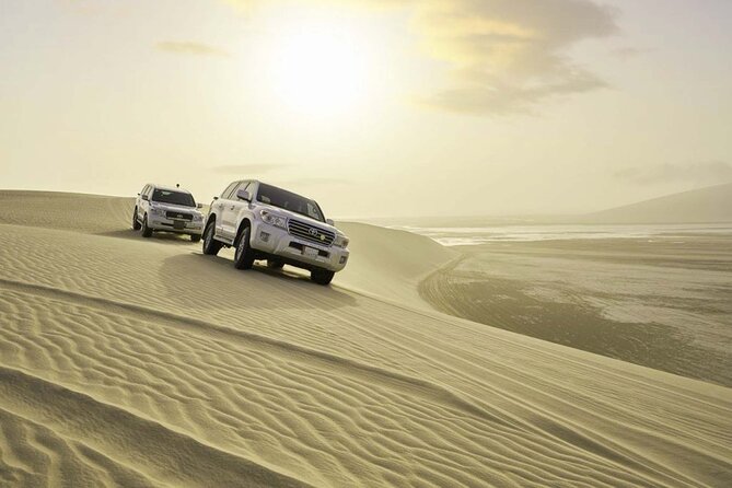 From Doha Airport: Desert Safari and Inland Sea Tour.