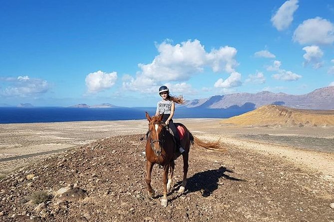 Horseback Riding in the Sunset of Famara Beach, Lanzarote, Spain - Experience the Stunning Scenery