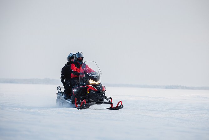 Ice Fishing and Snowmobile Safari Combo in Lapland