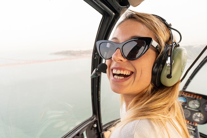Lisbon 360 City Tour: Bike Tour, Boat Trip and Helicopter Flight
