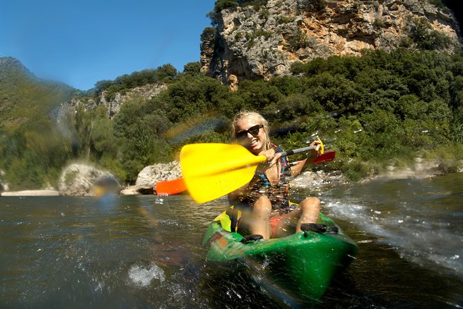 One Day Guided Tour: Kayaking, Zipline & Tubing in the Cave From Vang Vieng