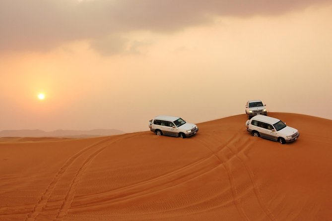 PRIVATE Dubai Desert Safari With BBQ Dinner, Camel Ride, Sand Boarding & Shows