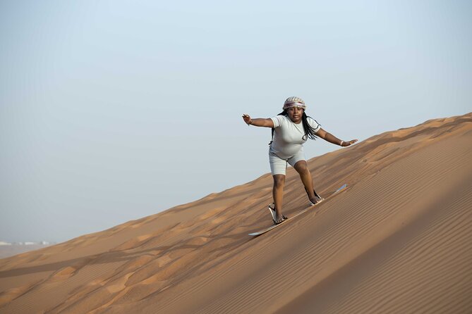 Sand Boarding Camel Ride and 1 Hour ATV in Dubai Lahbab Red Dunes