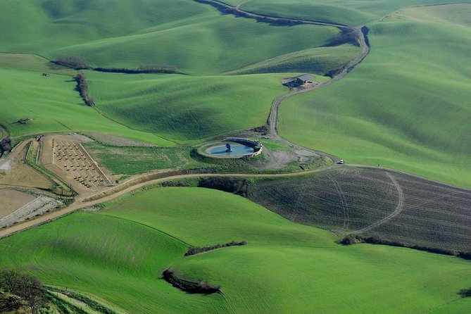 Volterra, Bocellis Theatre and San Gimignano Tour by Minivan