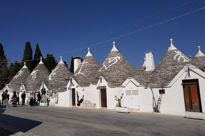 Afternoon Tour Secrets of Alberobello Incl. Food & Wine Tasting - Exploring Alberobellos Charming Old Town
