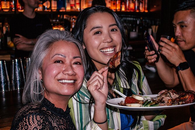 Bites and Booze: Walking Food & Drinking Tour in Culinary Hub - Taking in Local Flavors