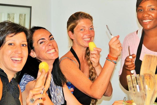 Boqueria Guided Market Tour and Paella Cooking Class - Discovering Traditional Spanish Flavors