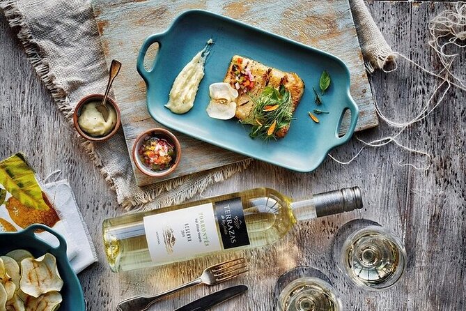 Charms of Mendoza: Private Tour 3 Wineries With Paired Lunch - Savoring Alfajores and Sin Fin Winery