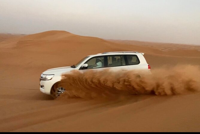 Desert Safari Tour With Camel Ride and BBQ Dinner in VIP Camp - Camel Riding Adventure