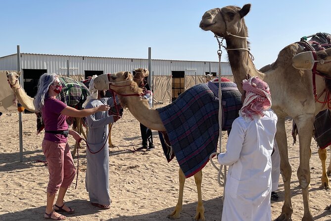 Doha Desert Safari With Camel Ride, Sand Boarding,Inland Sea Tour - Camel Riding Experience