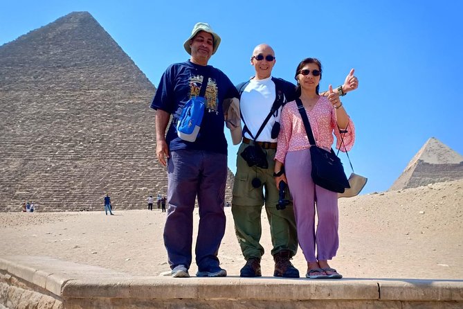 Half-Day Tour of the Giza Pyramids and Solar Boat Museum With Lunch and Camel Ride - Exploring the Giza Plateau