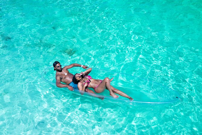 Island Love Stories: Turks & Caicos Clear Kayak Couple Portraits - Capturing Intimate Moments