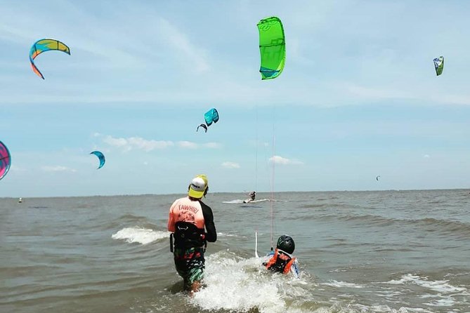 Kitesurf and Surf Lessons. Individuals and Groups. Derivatives - Cancellation Policy and Group Size