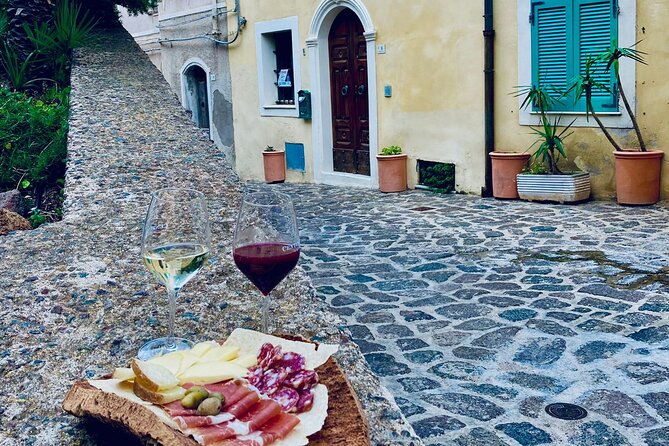Medieval Village Walking Tour With Aperitif in Castelsardo - Accessibility and Participation