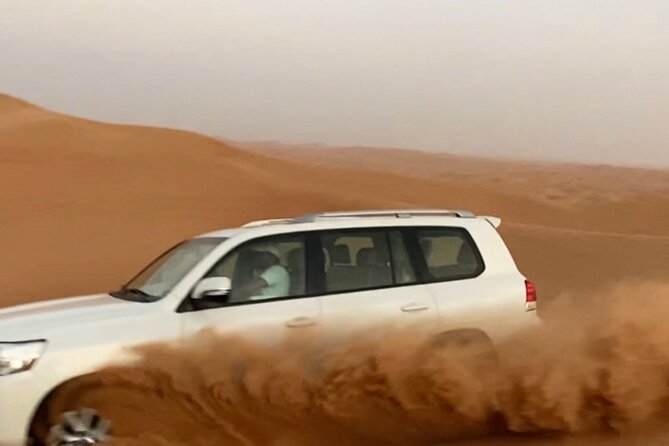 Morning Red Dune Safari With Sandboarding and Camel Ride - Meeting and Pickup