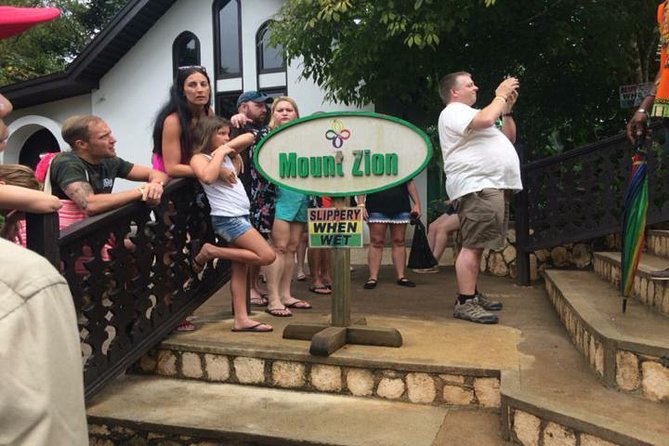 Nine Miles and Dunns River Falls Tour From Negril Hotels - Pickup and Start Time