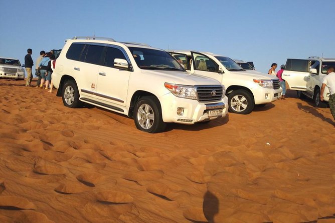 Red Dunes Dubai Desert Safari With Live Show, Sandboarding & BBQ - Thrilling Dune Bashing Experience