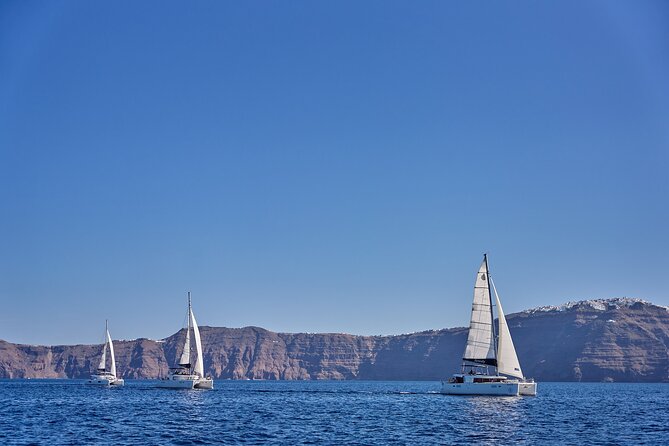 Santorini Oia: Caldera Luxury Day Cruise With BBQ & Drinks - Onboard Greek Barbecue Lunch