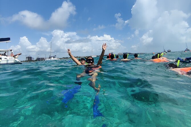 Top Isla Mujeres Catamaran Tour With Snorkel Open Bar and Buffet Lunch - Duration and Location