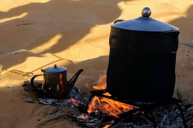 2 Days Tour to Douz & Ksar Ghilan Oasis. and an Overnight in the Sahara Under Bedouin Tent .. Dinner in the Camp, Private Jeep - With English Speaking Guide. - Pickup and Start Time