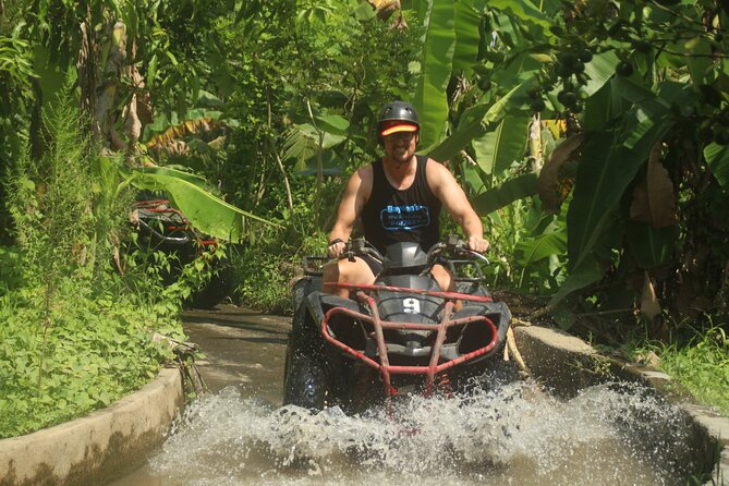 ATV Quad Bike Through Tunnel and Waterfall - The Sum Up