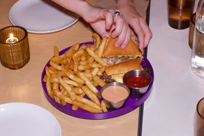 Bites and Booze: Walking Food & Drinking Tour in Culinary Hub - Indulging in Shared Bites