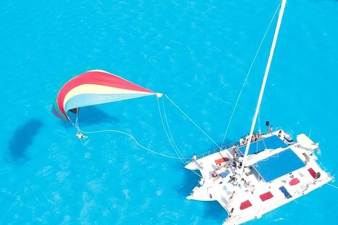 Catamaran Sailing to Isla Mujeres With Snorkeling, Lunch & Open Bar Included - Meeting Point and Departure
