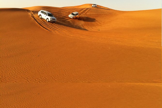 Dubai Red Dune Extreme Desert Safari Adventure With Sand Boarding - Quad Biking Excitement