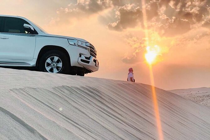 From Doha Airport: Desert Safari and Inland Sea Tour. - Pickup Information