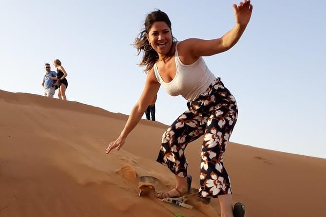 PRIVATE Dubai Desert Safari With BBQ Dinner, Camel Ride, Sand Boarding & Shows - Delicious BBQ Dinner