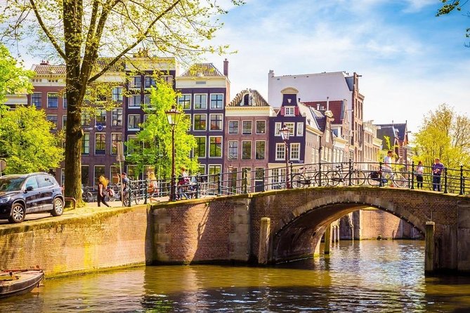 Private Tour: Highlights of Amsterdam + Zaanse Schans Village + Cheese Farm - Dutch Cheese Tasting