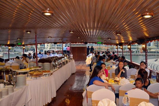 Sharing Abu Dhabi City Tour With Ferrariworld or Warnerbros Tickt - Savoring a Delightful Dinner