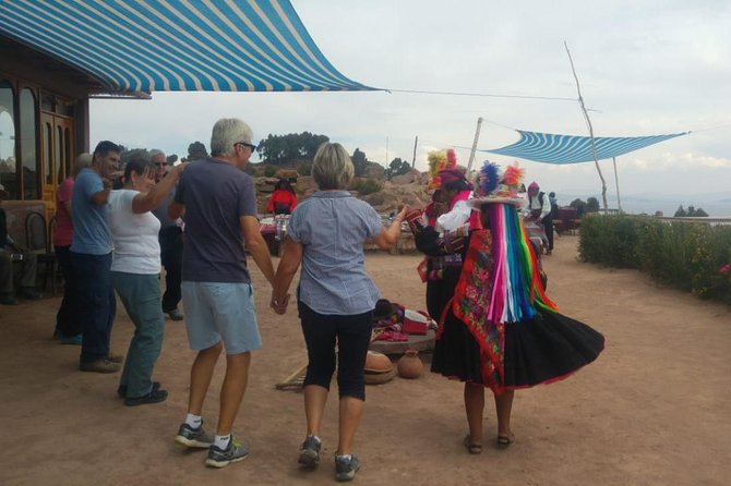 A Full Day Tour View: Uros and Taquile Islands on the Titicaca Lake From Puno - Pricing and Cancellation Policy