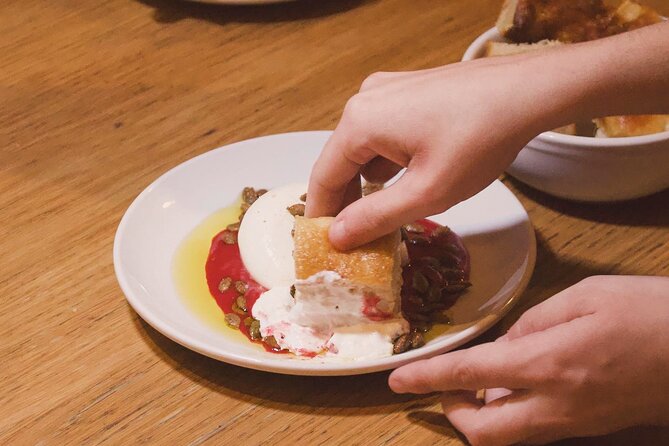 Bites and Booze: Walking Food & Drinking Tour in Culinary Hub - Sipping Crafted Libations