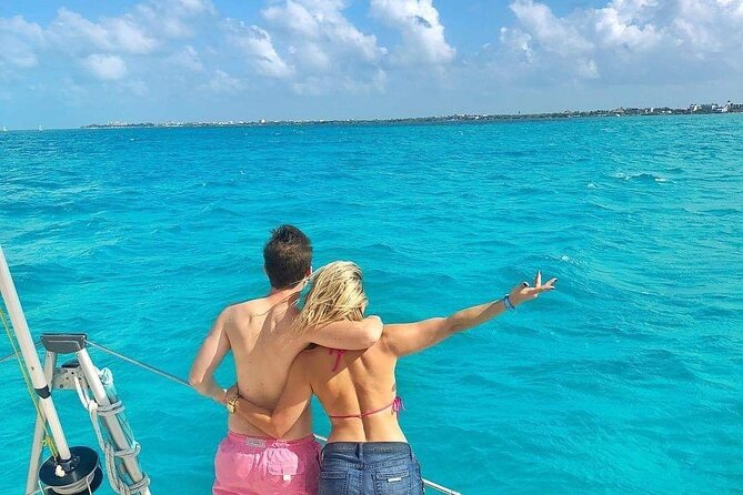 Isla Mujeres Catamaran Tour With Snorkel, Open Bar and Transport - Safety and Accessibility