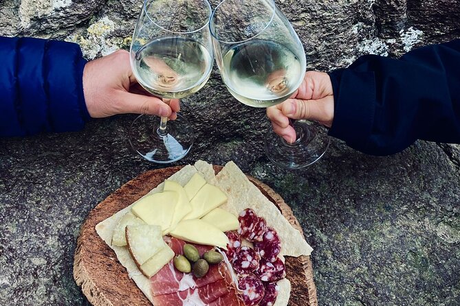 Medieval Village Walking Tour With Aperitif in Castelsardo - Exploring the Winding Streets