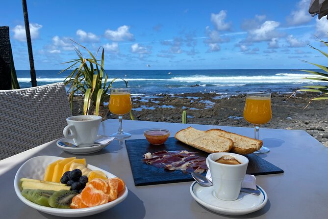 Morning Tai Chi Stretching on the Lava Beach and Organic Breakfast in Lanzarote - Booking and Pricing Information