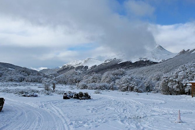 Snow Day Adventure: Hike & Moto Ski at Llanos Del Castor - Thrilling Snowmobile Ride