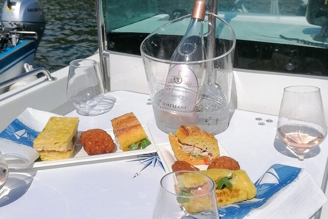 Sunset Boat Cruise With Wine and Fish Tasting From Garda - Reviews