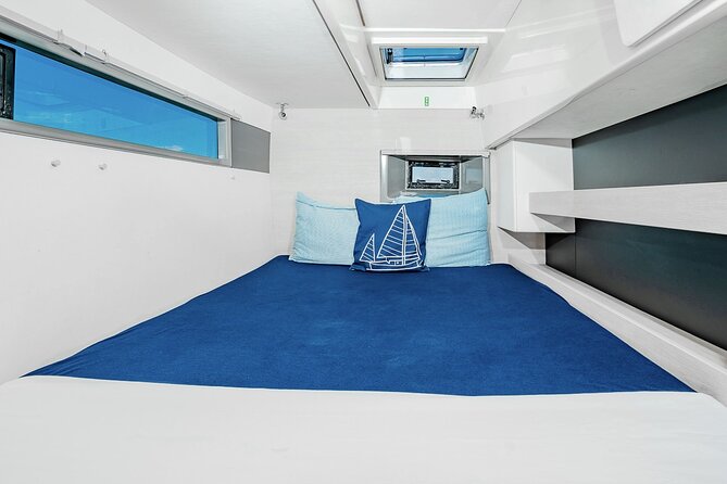 8-Hour Private 40 Catamaran 2Stop Tour to Cozumel Beach, Food, Drinks & Snorkel - Boat and Itinerary