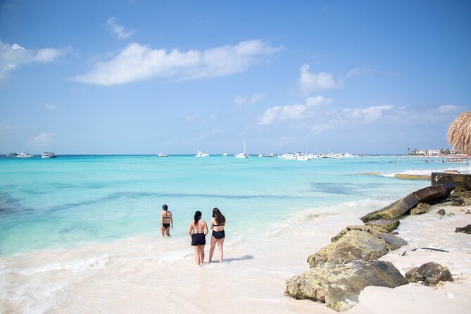 Catamaran Sailing to Isla Mujeres With Snorkeling, Lunch & Open Bar Included - Snorkeling and Beach Club Access