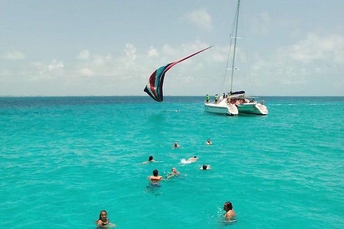 Catamaran to Isla Mujeres, Open Bar, Buffet, Beach Club Included - Highlights of the Tour