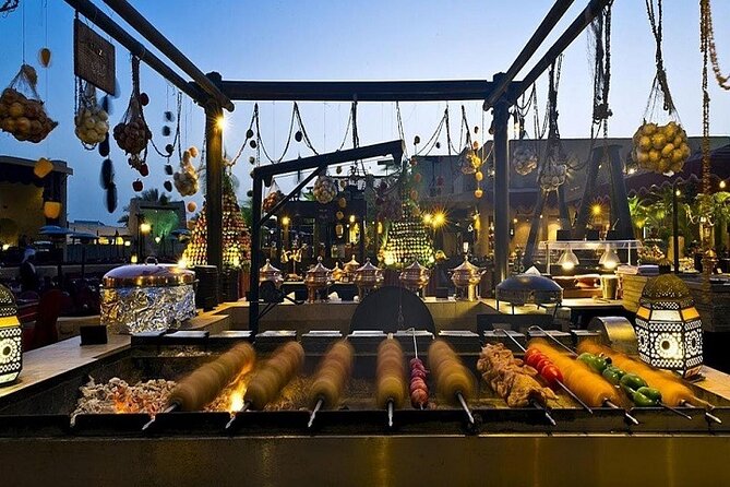 Dubai Desert Safari Red Dune: BBQ, Camel Ride & Sandboarding - Traditional Dance Performances and Henna Art
