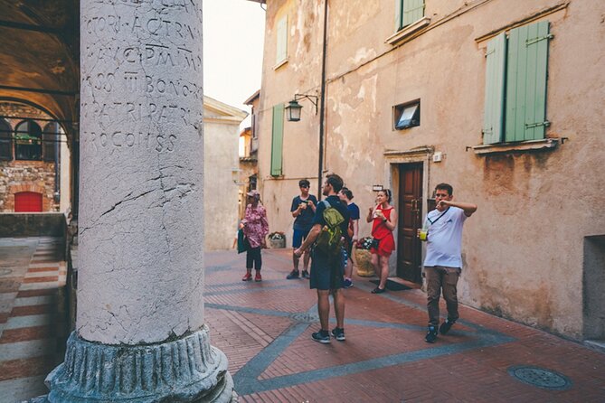 Lake Garda: Sirmione Boat Tour and Walking Tour - Guided Boat Tour Experience