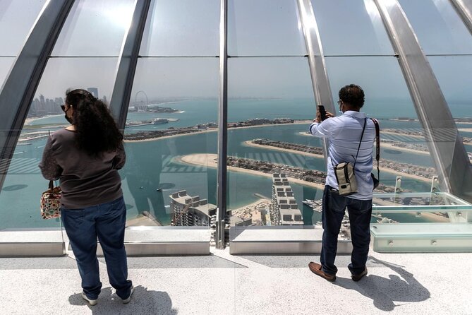 Palm Jumeirah Island Tour With Revolving 360 View From the View at the Palm ! - Booking and Cancellation Policy