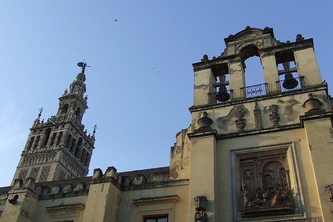 Santa Cruz Evening Walking Tour in Seville Including Tapas and Drinks - The Sum Up