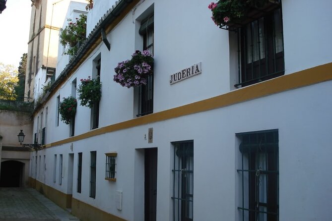Santa Cruz Quarter and Alcazar Guided Day Tour in Seville - Cancellation and Support