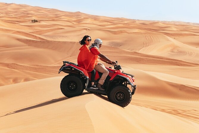 Sunrise in Dubai Desert Safari With Dune Bashing & Camel Ride - Quad Biking Fun